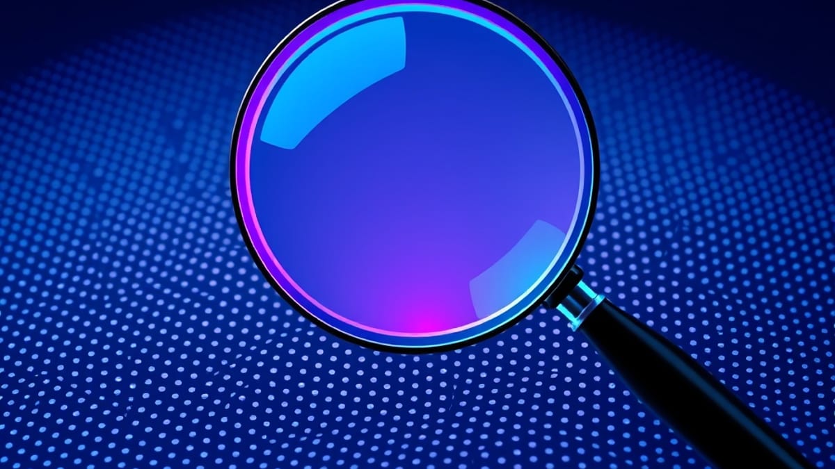 A magnifying glass over a field of identical dots, its lens showing a blurred smear and faint empty outlines.