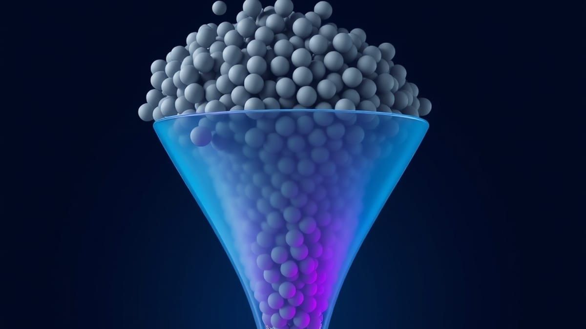 A glass funnel with a brass mesh grid narrowing a cloud of gray spheres into a few glowing amber cubes on a white surface.